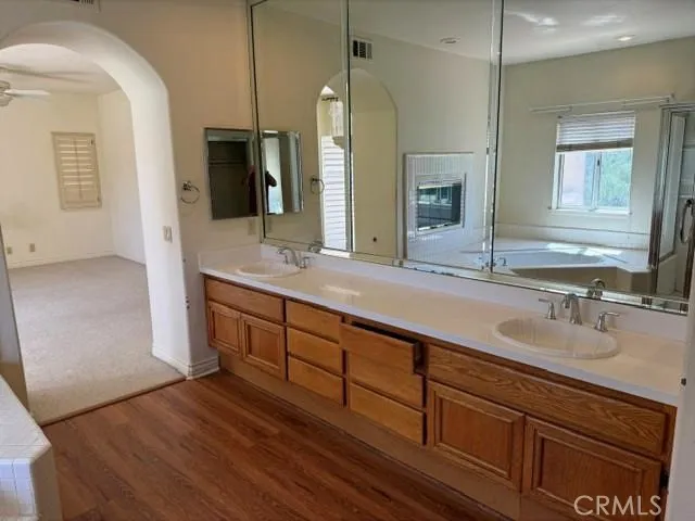 Main bathroom with dual vanities