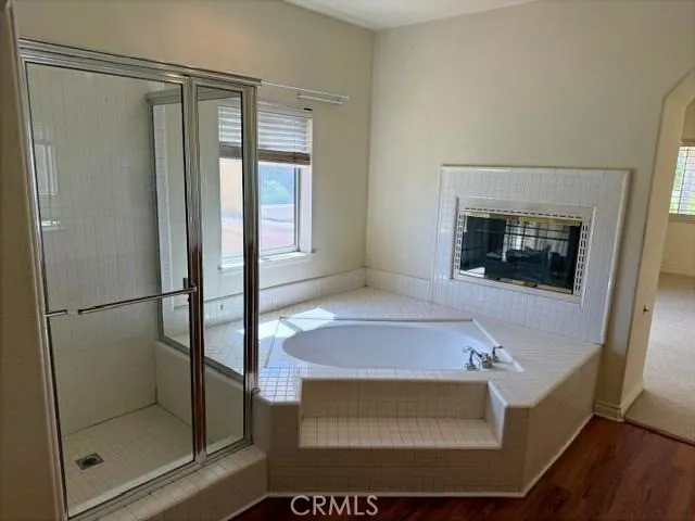 Main bathroom tub and fireplace!