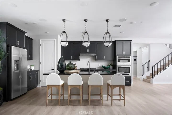 Photos shown are of the model home for this floor plan. Actual finishes, features, and landscaping may vary.