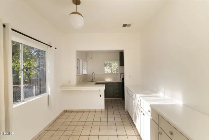 11-web-or-mls-9900 Sunland Blvd by Pierr