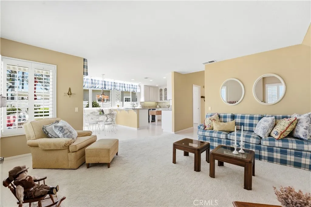 Family room open to the kitchen, and casual dining area.