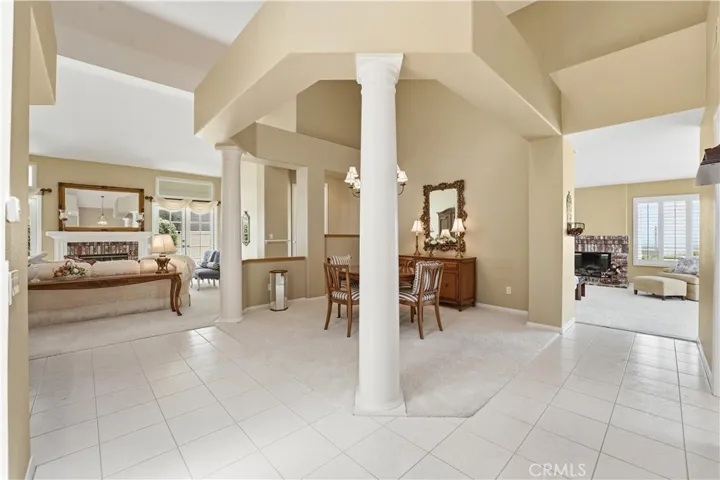 Entry leads to living room, formal dining room and the kitchen