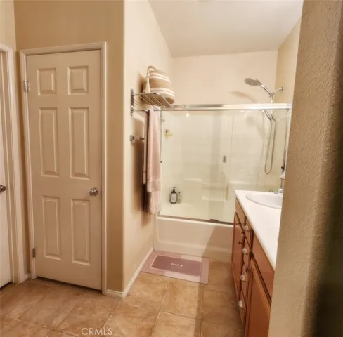 master bedroom with walk-in closet