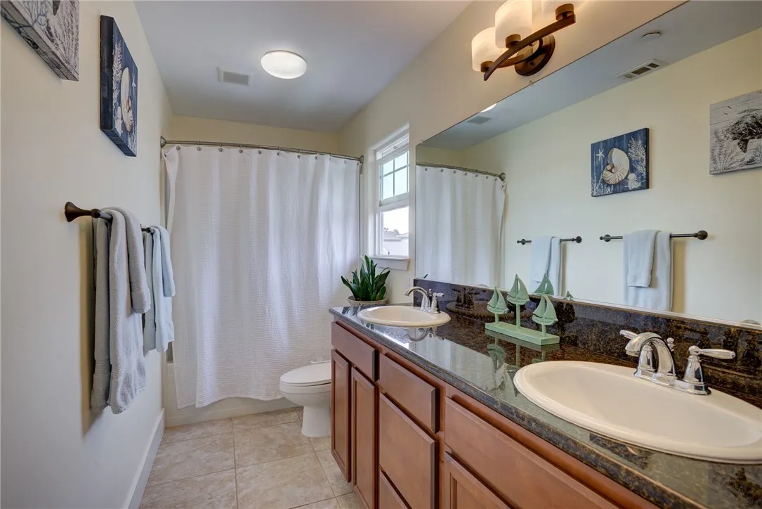Bathroom 2 with double vanity and generous counter space (Upstairs) Bathroom 2 with double vanity and generous counter space (Upstairs)