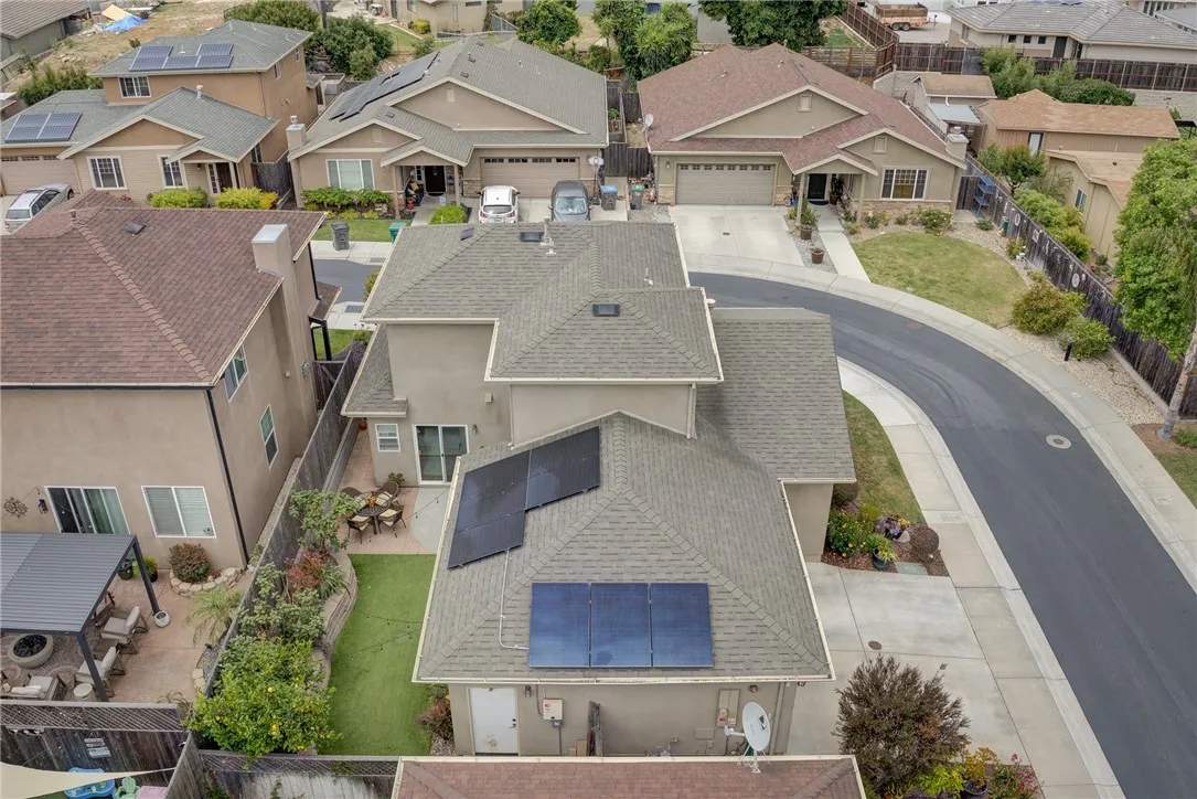 Aerial View showing solar panels and backyard Aerial View showing solar panels and backyard