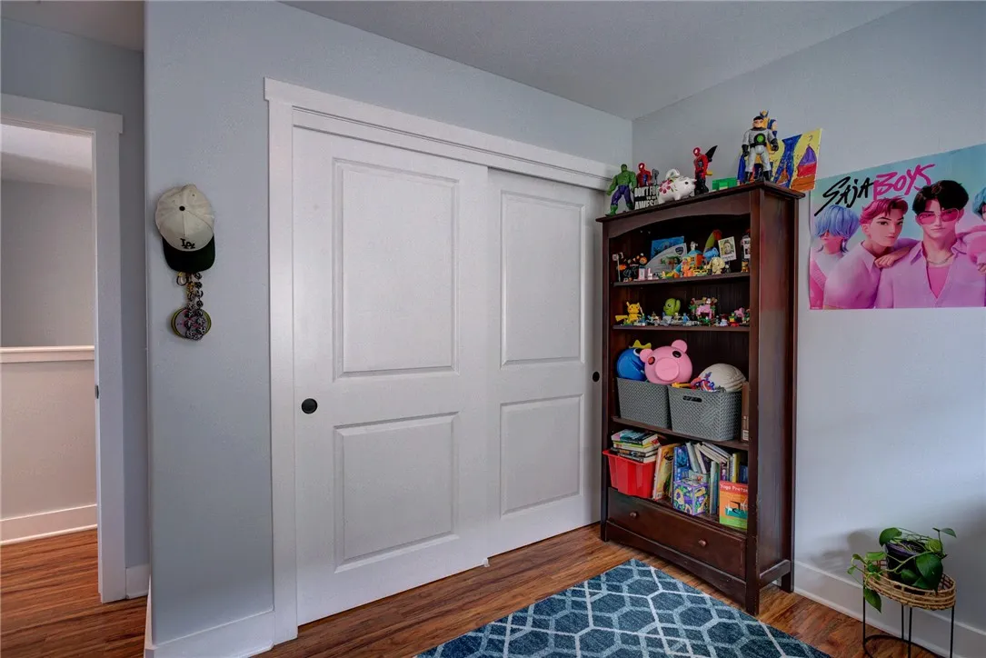 Bedroom 1 with sliding closet that offers ample storage (Upstairs) Bedroom 1 with sliding closet that offers ample storage (Upstairs)