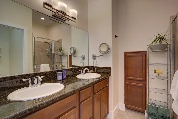 Primary Bathroom with dual sinks (Downstairs)