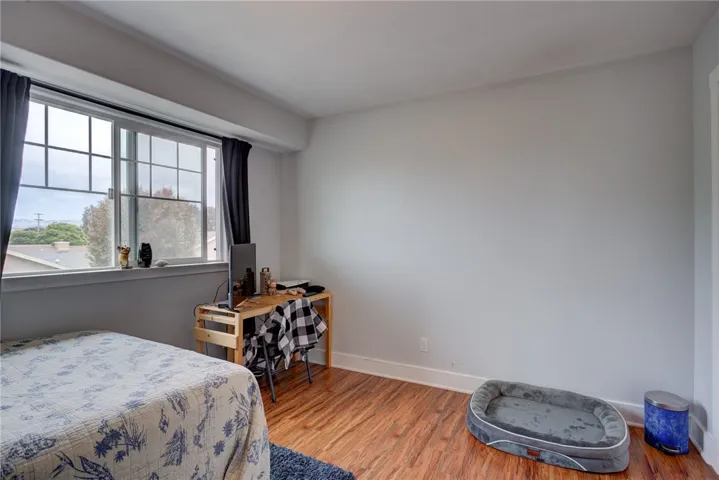 Bedroom 2 with a spacious, bright layout (Upstairs)