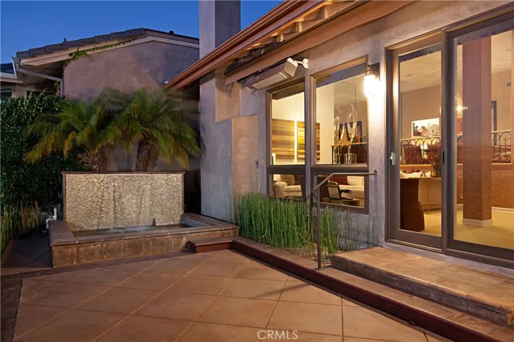 Entertaining Backyard Offers a Jacuzzi with Waterfall, Fire-pit, a Built-In BBQ Grill and a Spectacular View.