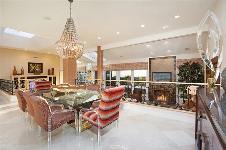 Previously Staged Elegant Formal Dining Room.