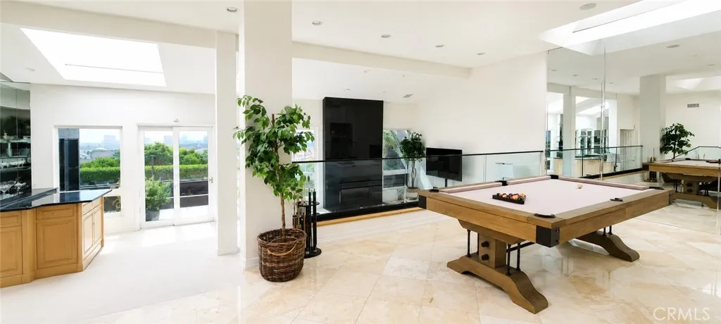 Formal Dining Room is Currently Used as a Pool Room.