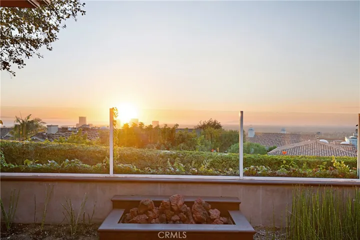 Panoramic Sunset, Ocean and City Light Views.