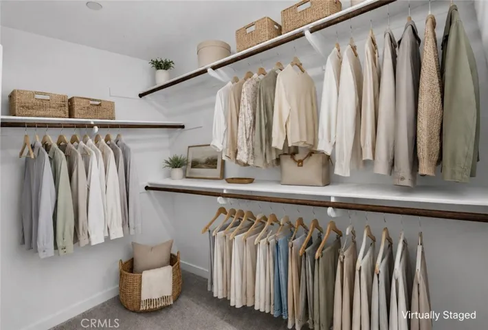 Expansive Walk-In Closet! Disclaimer: Some items have been virtually staged