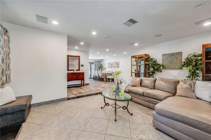 Open and Inviting Floor Plan that leads from the Living Room, to the Dining Area and Kitchen