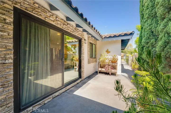 Sliding Glass Door from Dining Area to Side Patio Area
