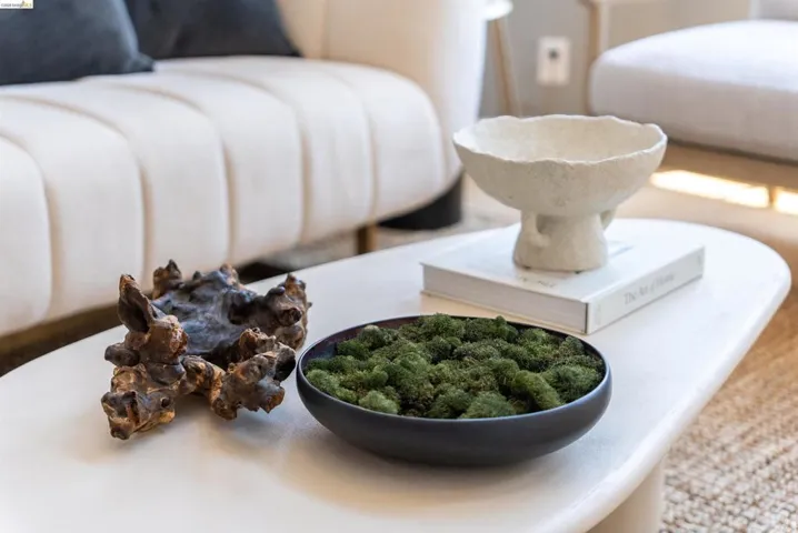 White curved-edge coffee table featuring a textured surface