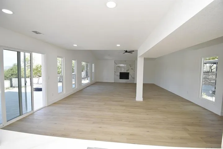 SLIDING GLASS DOOR LEADS TO PATIO