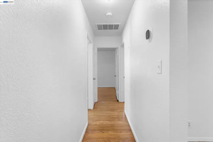 Hallway To 3 Bedrooms