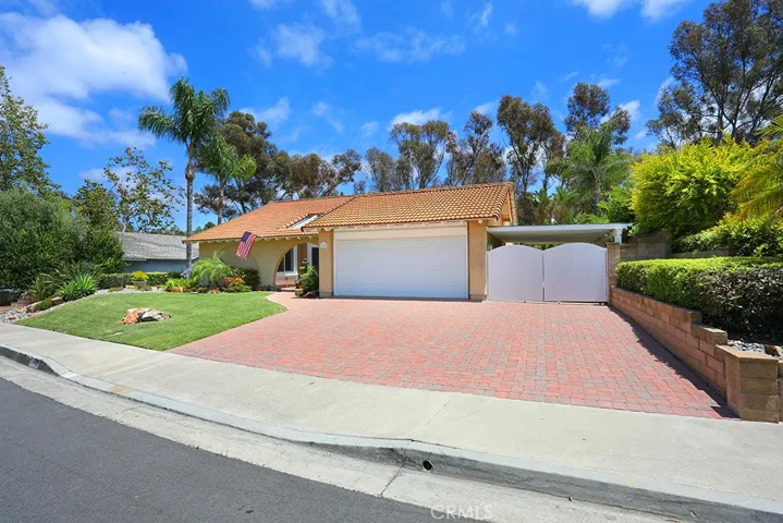Charming Curb Appeal with Extra-Wide Paver Driveway