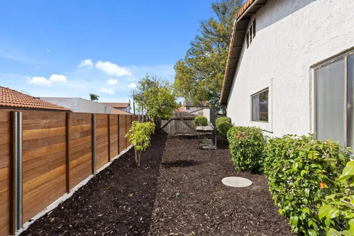 side yard with room for RV parking