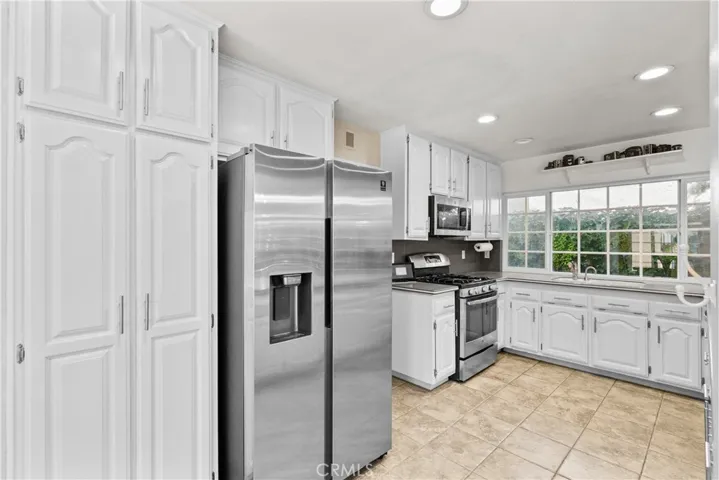 Storage galore ~ newer stainless refrigerator