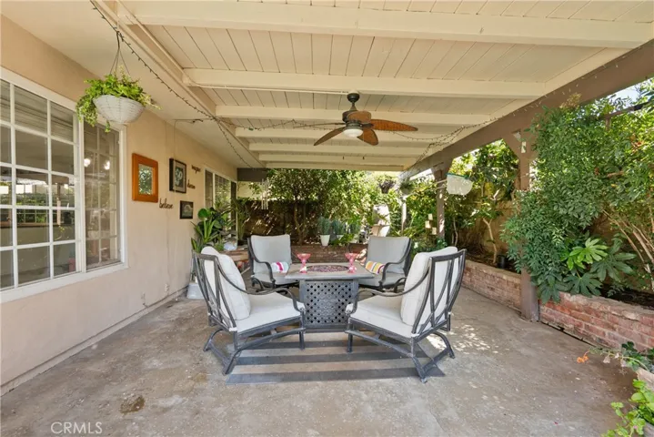 Attractive covered patio with ceiling fan
