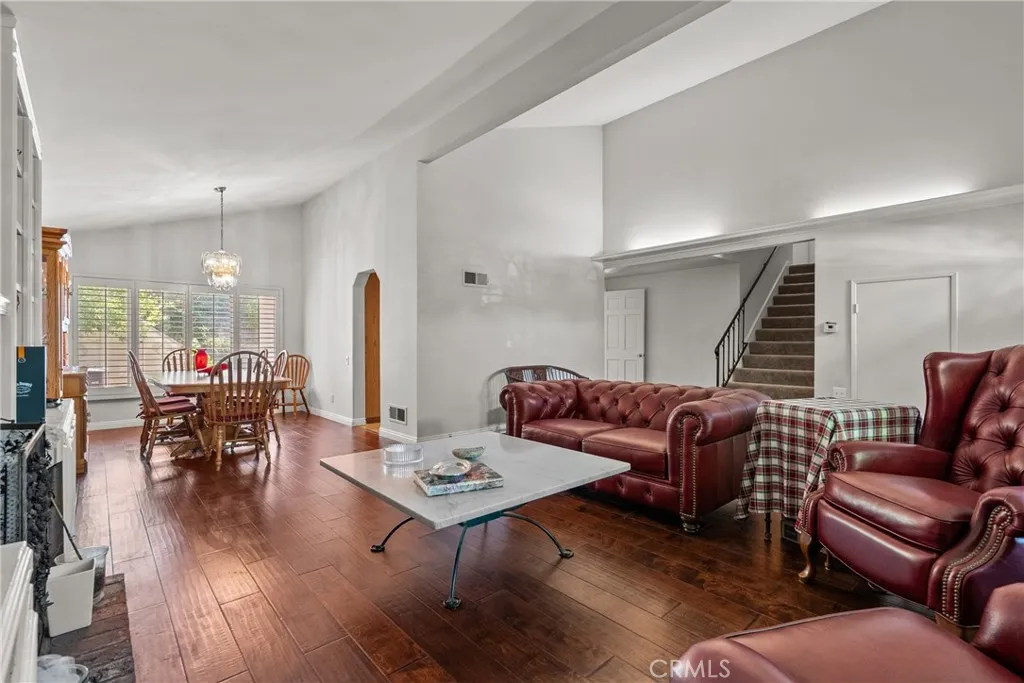 Living room open to dining room.
