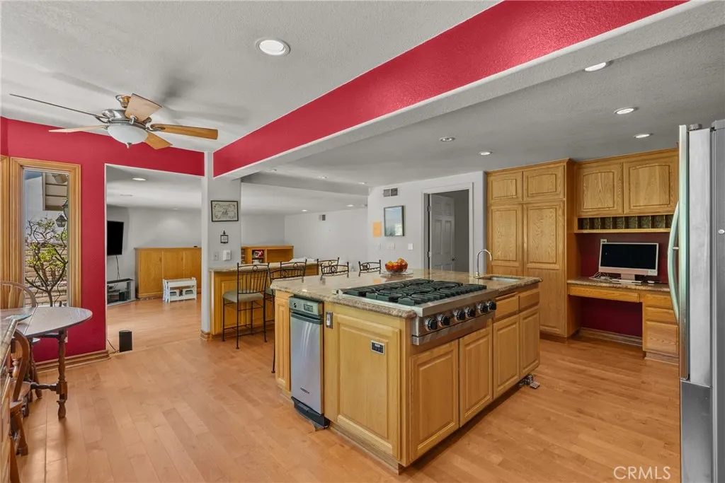 Spacious breakfast nook open to kitchen.