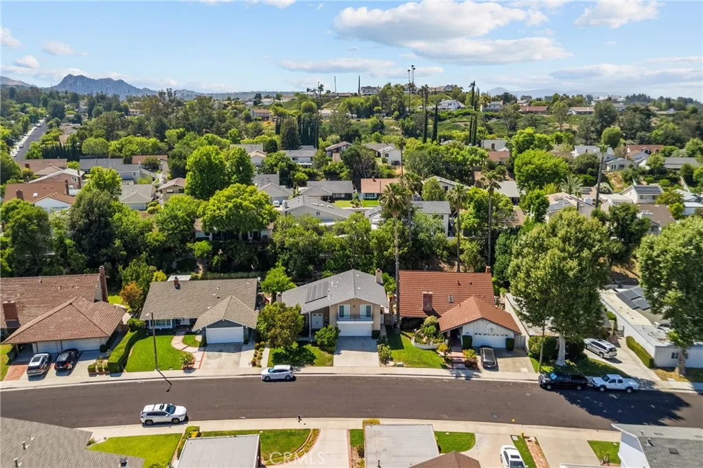 Aerial view of the home and street.