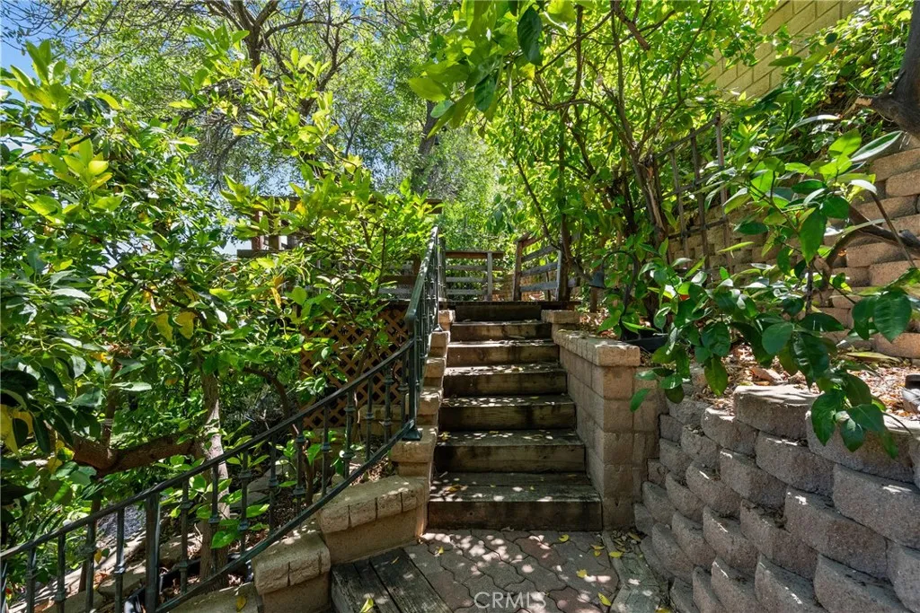 Steps to sitting area in backyard.
