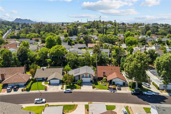 Aerial view of the home and street.