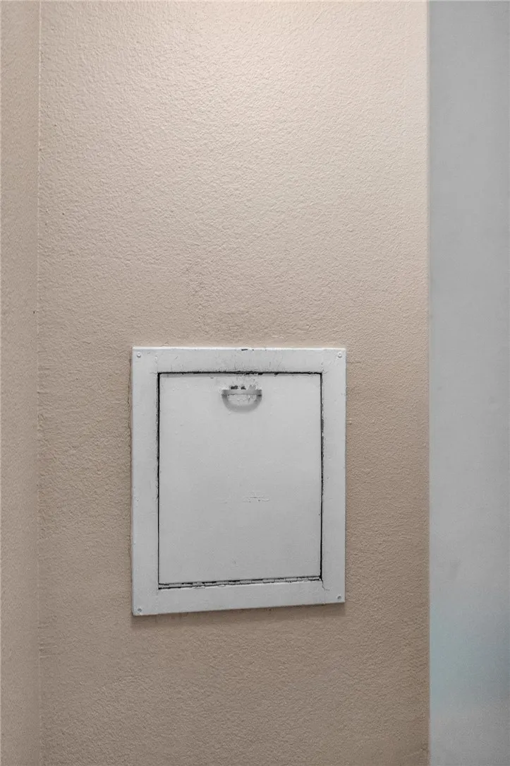 Trash Chute in the building hallway next to the unit.