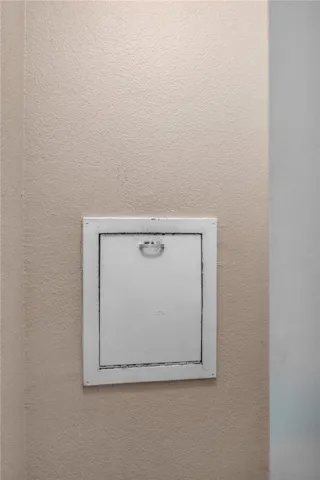 Trash Chute in the building hallway next to the unit.