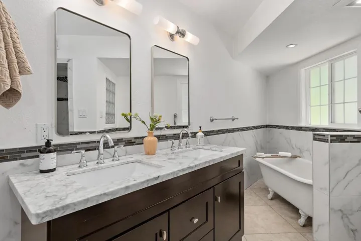 Primary Bathroom with clawfoot tub