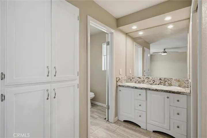 Dual Vanity Sinks in Primary + Granite Countertop