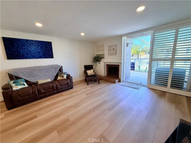 Very spacious Living Room with Gas Fireplace and a large private patio wioth ocean views!