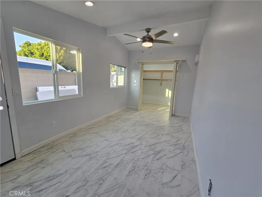 Newly added bonus room suitable for office, study, hobby or storage use with walk in closet.