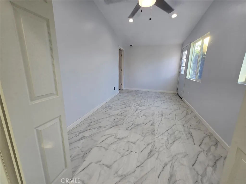 Newly added bonus room suitable for office, study, hobby or storage use with walk in closet.