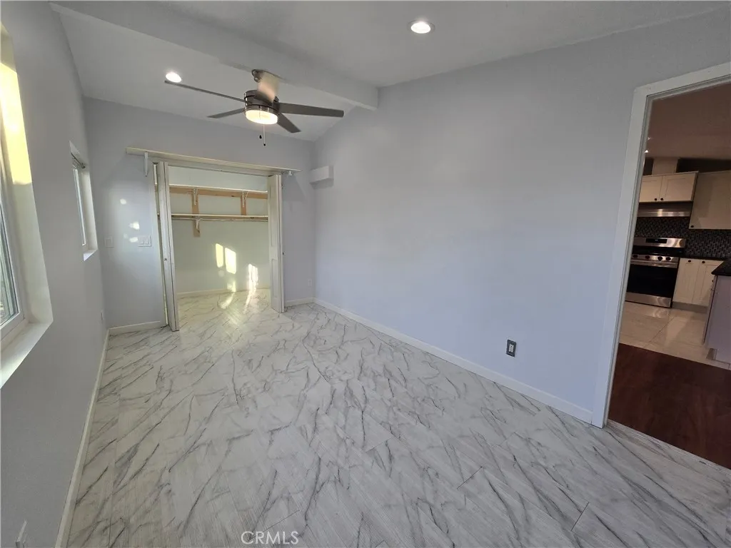 Newly added bonus room suitable for office, study, hobby or storage use with walk in closet.