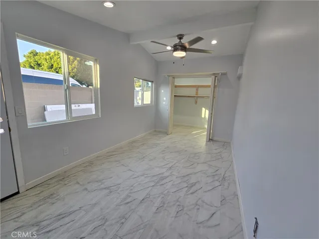Newly added bonus room suitable for office, study, hobby or storage use with walk in closet.