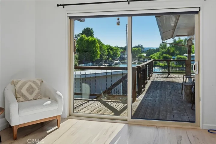 Primary En Suite Sitting Area w/ Deck Access & Views