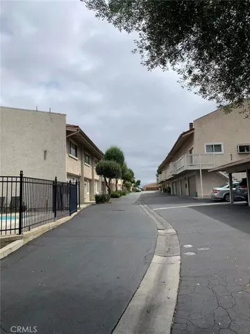 Primary driveway in and out of the community (unit 48 at the very end on the right side).