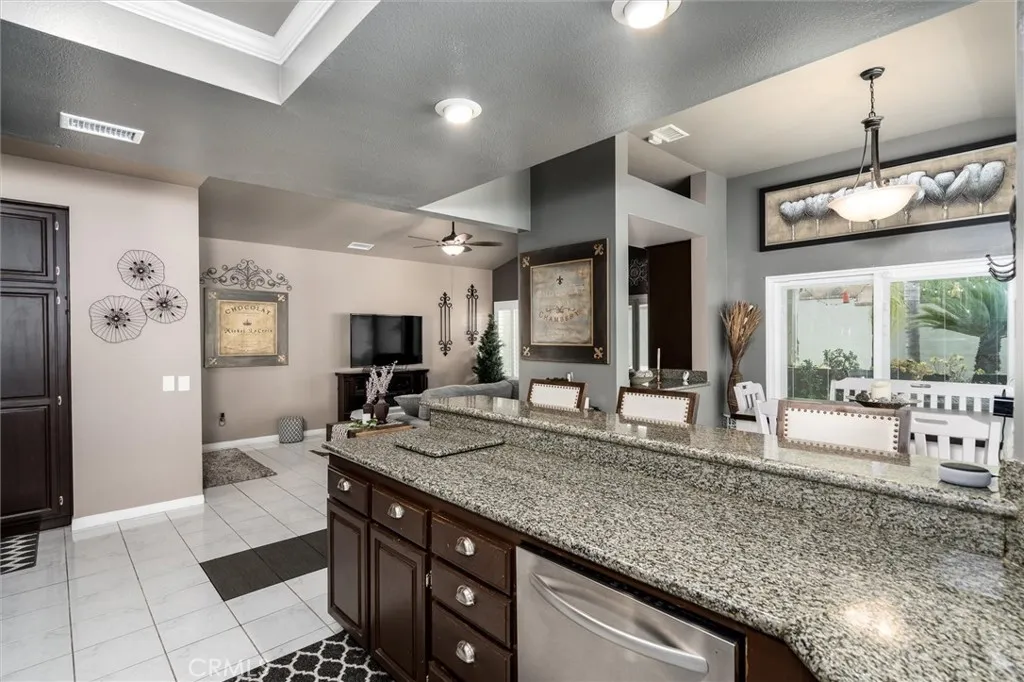Kitchen with view of Family room.