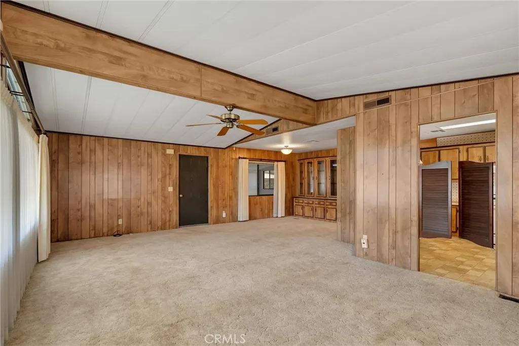 Entry door with enclosed sunroom through window