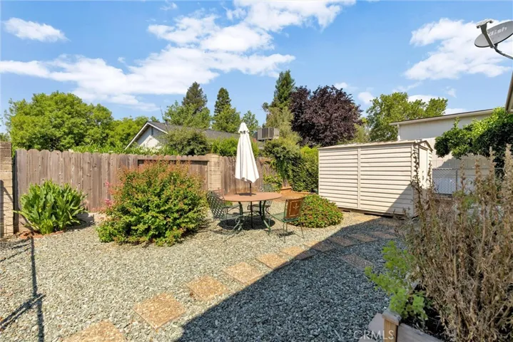Private rear yard with seating area