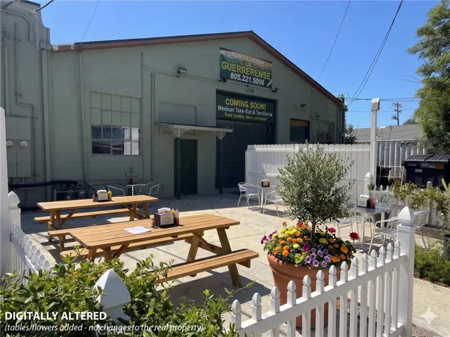 This image has been digitally enhanced to include outdoor seating and potted plants at this soon-to-be-opened tortilleria.