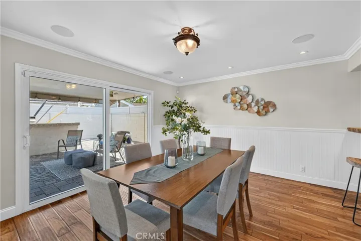 Dining Room with a second sliding glass door to the Backyard.