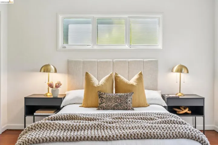 White walls with wood-finish flooring
