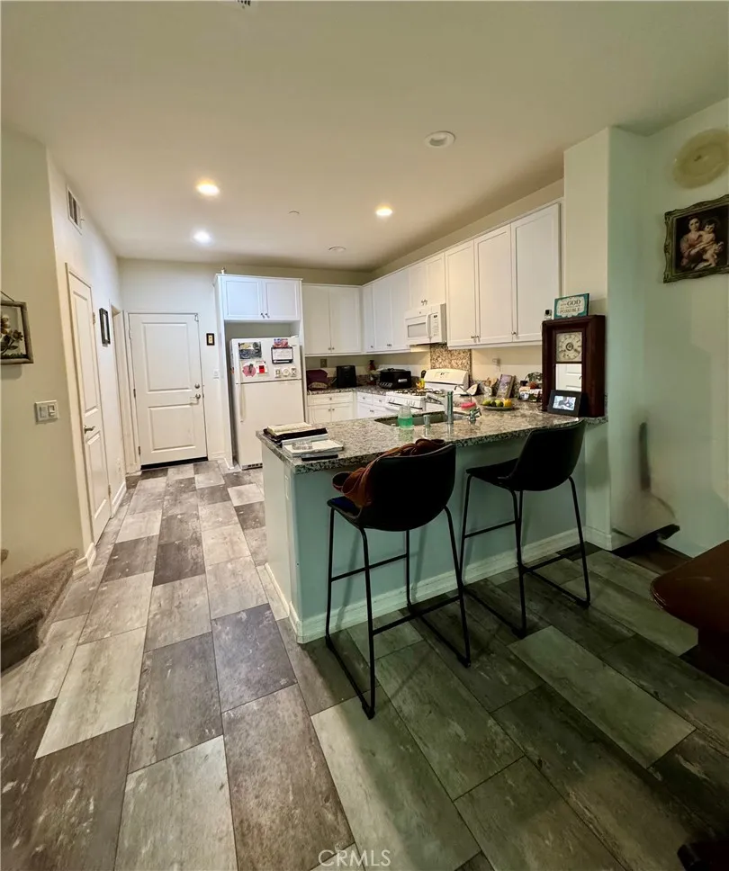 Bar top seating; pantry closet