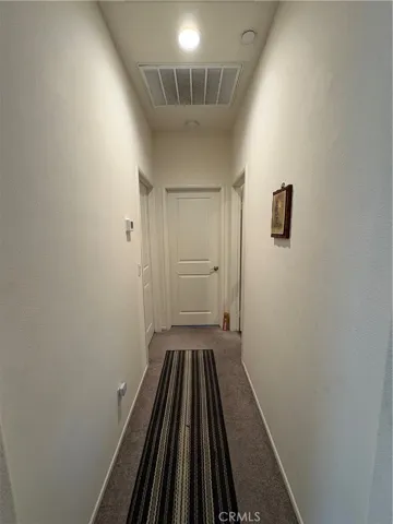 Hall to bathroom and bedrooms